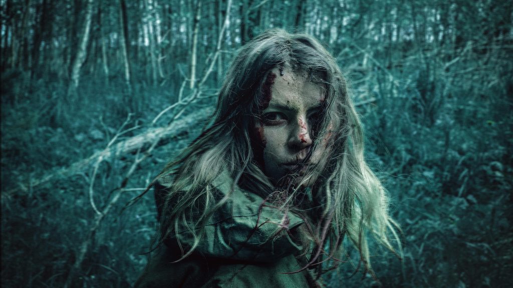 image by Евгений Горман (https://www.pexels.com/photo/blonde-girl-covered-with-mud-and-blood-in-gloomy-forest-10040325/)